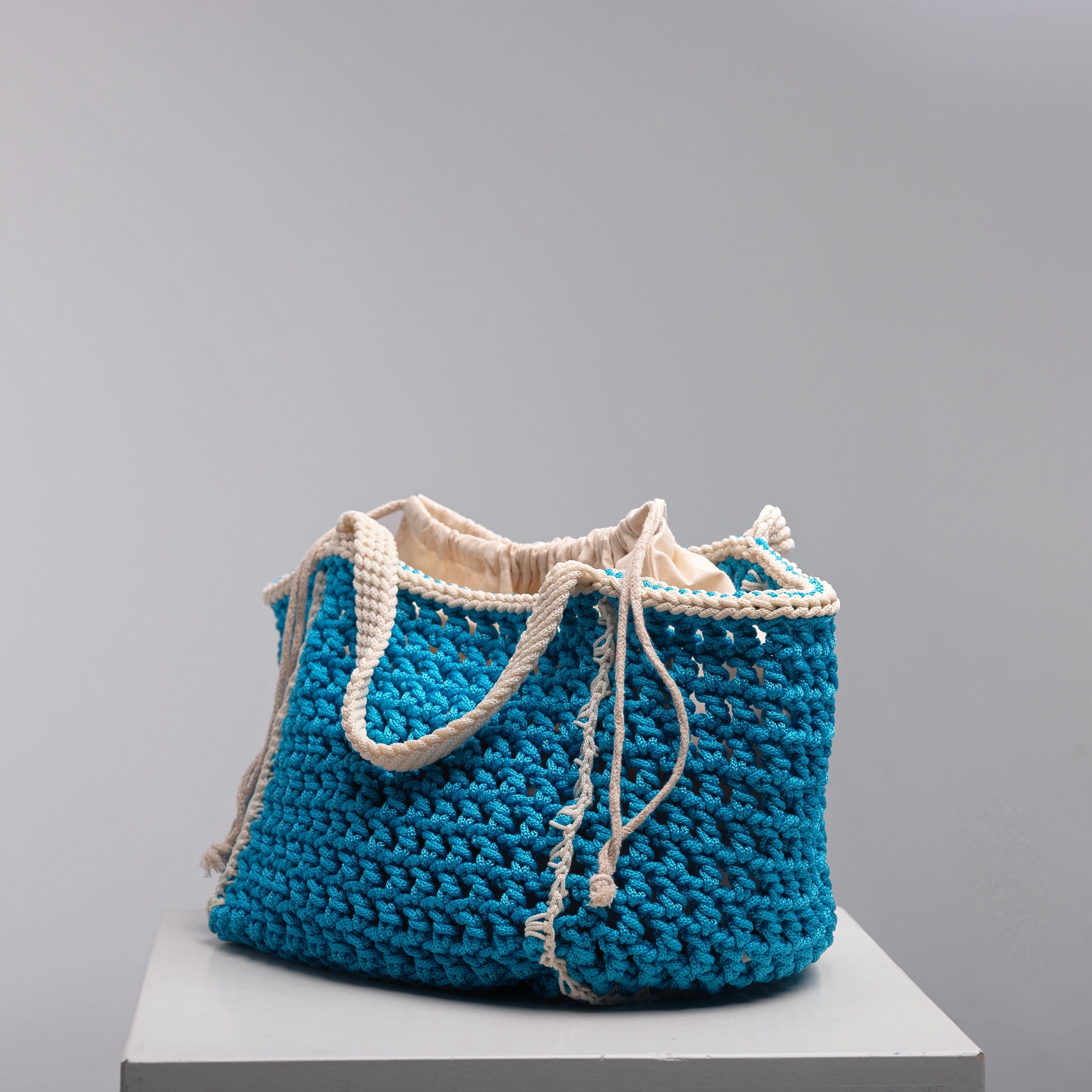 Amalfi crochet beach bag with removable cotton pouch by ZOEL