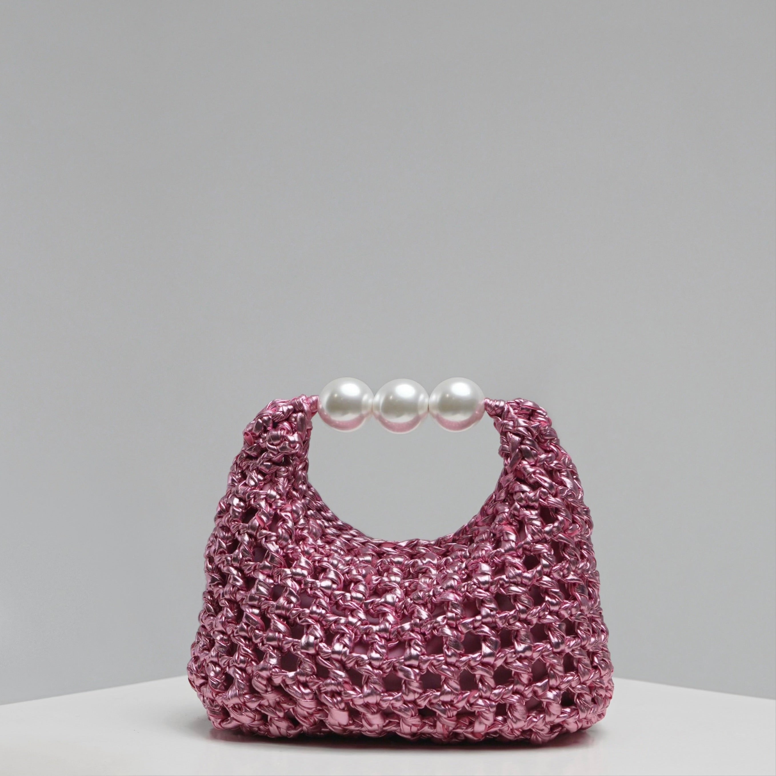 Luna medium handmade bag by ZOEL, metallic pink leather effect with pearl handle, luxury tote bag