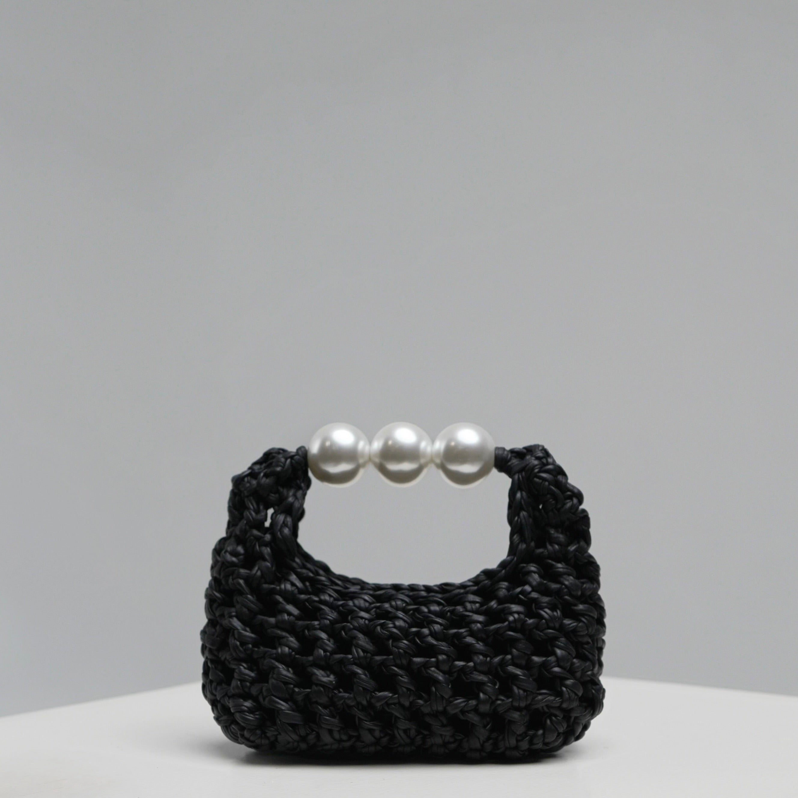 Handmade crochet mini bag Luna by ZOEL, elegant black luxury bag, Pearl handle