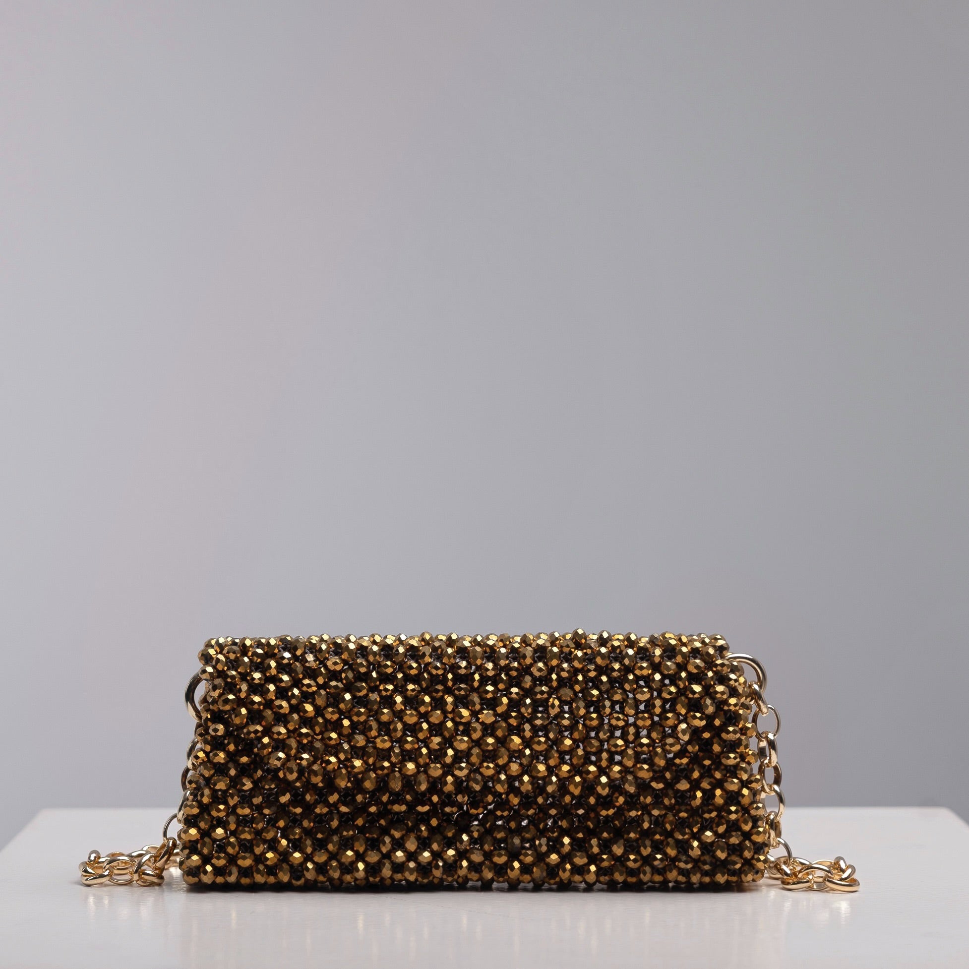 Gold Crystal Baguette shoulder bag with gold chain, statement handmade design by ZOEL.