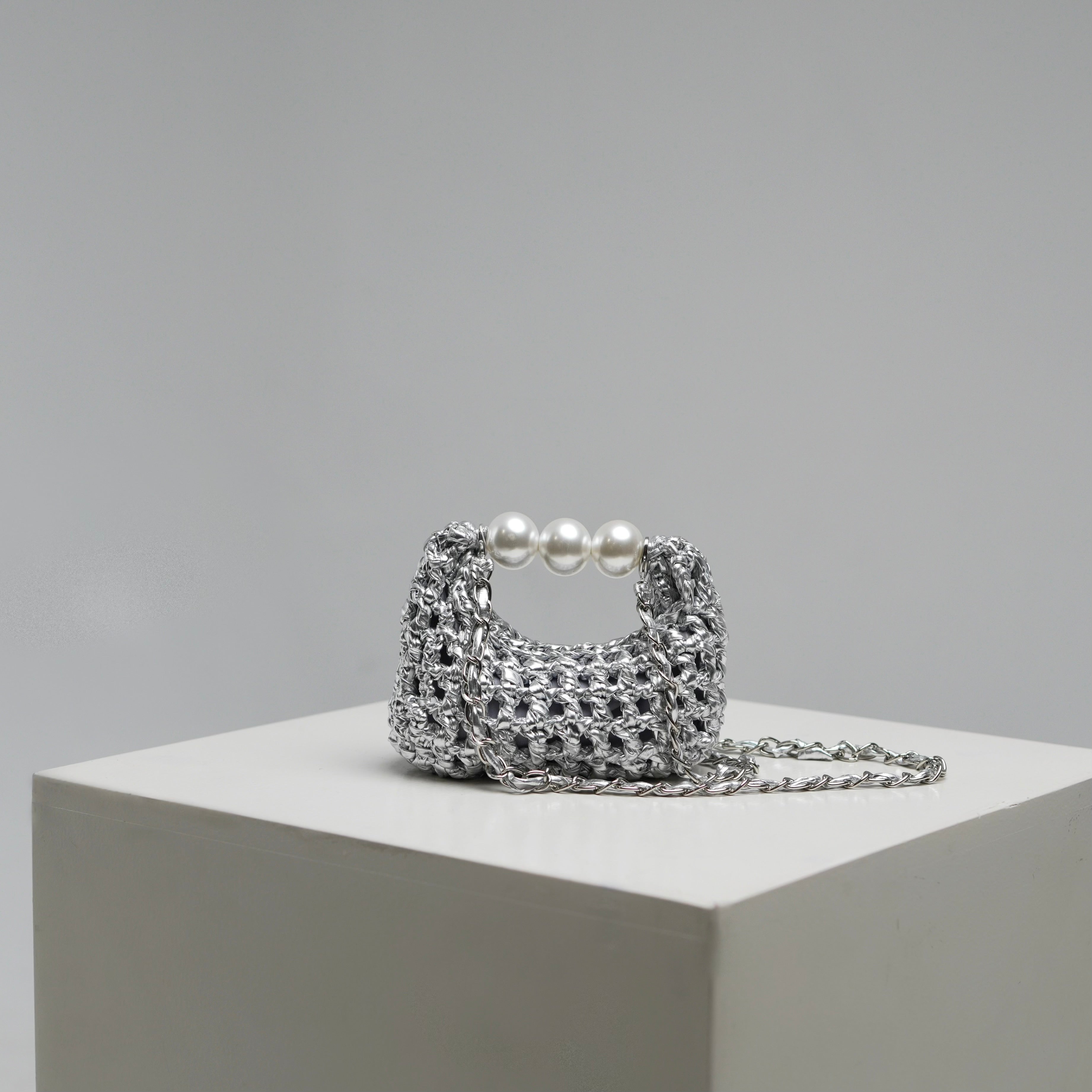 Handmade crochet mini bag Luna by ZOEL, elegant metallic silver luxury bag, Pearl handle, crossbody chain