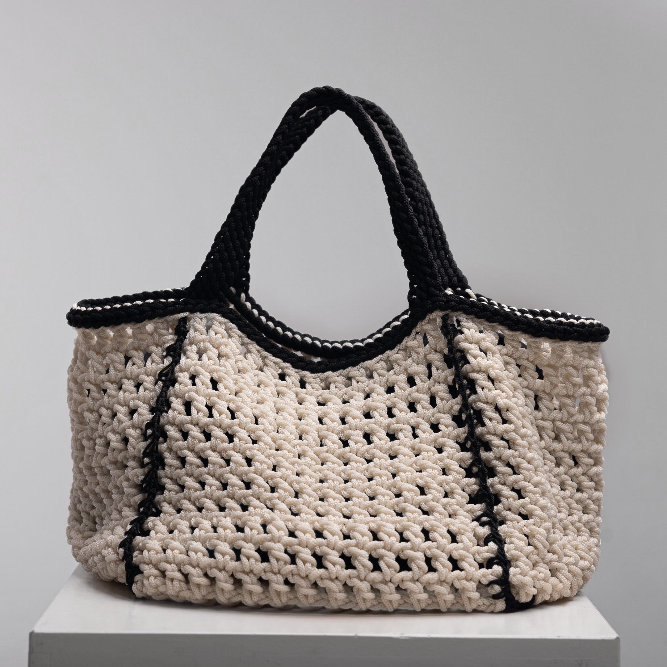 Handmade Amalfi beach bag by ZOEL, luxury crochet tote with ecru or black handles