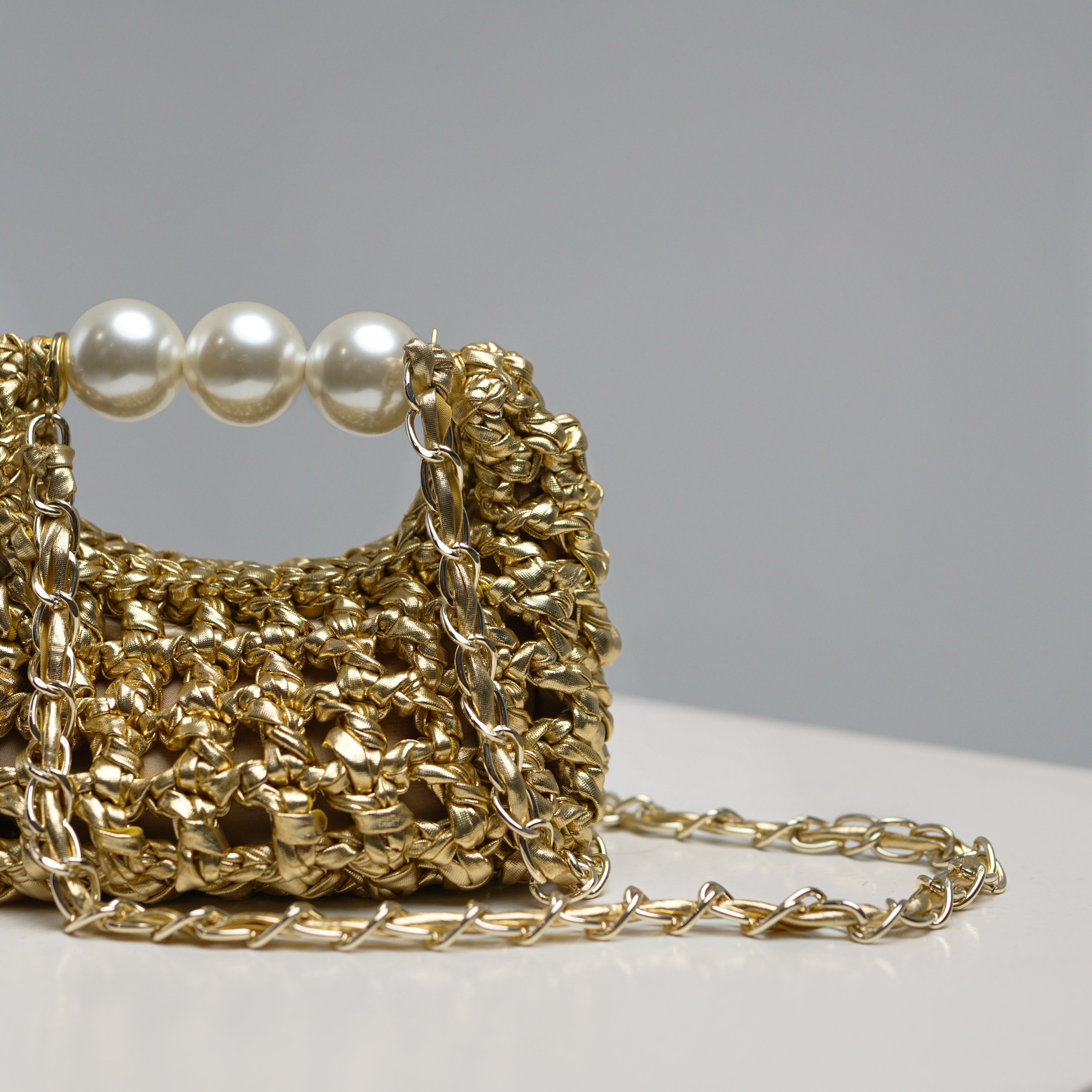 Handmade crochet mini bag Luna by ZOEL, elegant metallic gold luxury bag, Pearl handle, crossbody chain